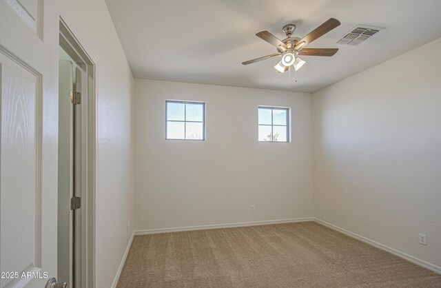 6192 S Claiborne Ave, Gilbert, AZ 85298 - carpeted empty room with ceiling fan, baseboards, and visible vents