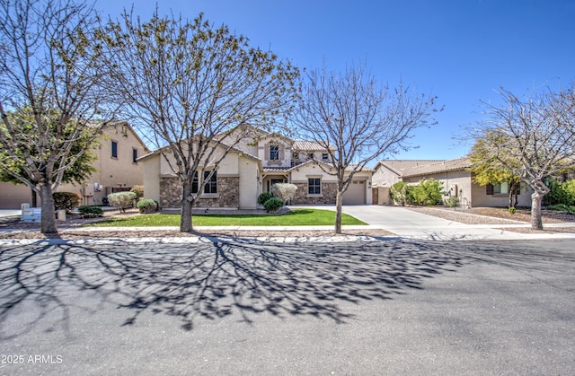 6192 S Claiborne Ave, Gilbert, AZ 85298 - view of front facade with a tiled roof, a garage, stucco siding, stone siding, and driveway