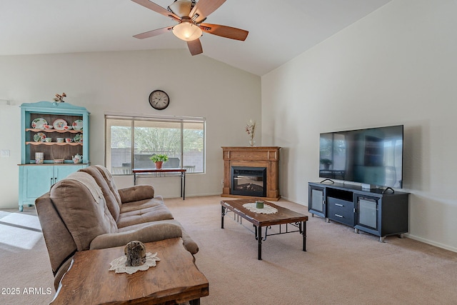 carpeted living room featuring lofted ceiling and ceiling fan