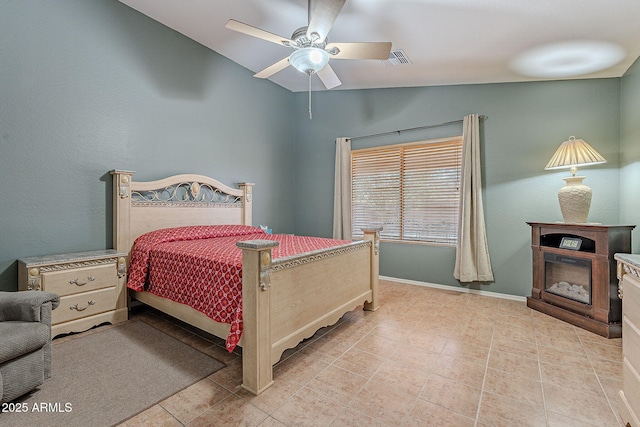 bedroom featuring lofted ceiling and ceiling fan