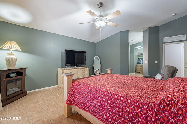 bedroom with vaulted ceiling and ceiling fan