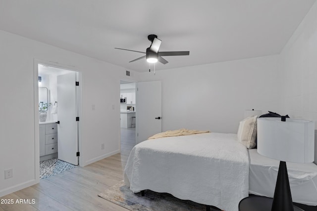 bedroom with light wood-type flooring and ceiling fan