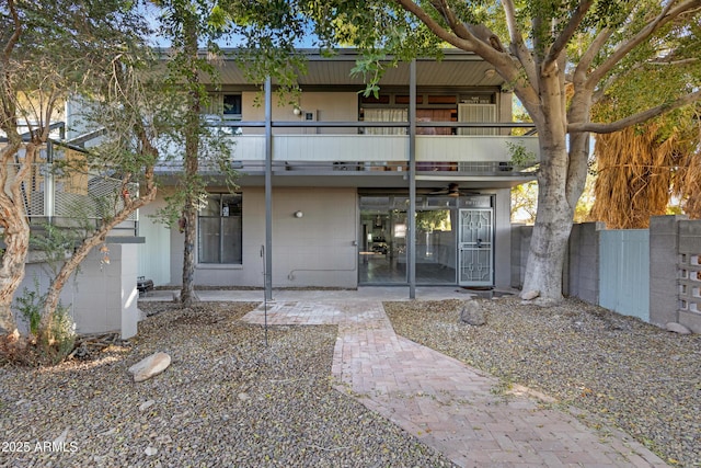 exterior space with a balcony and a patio area