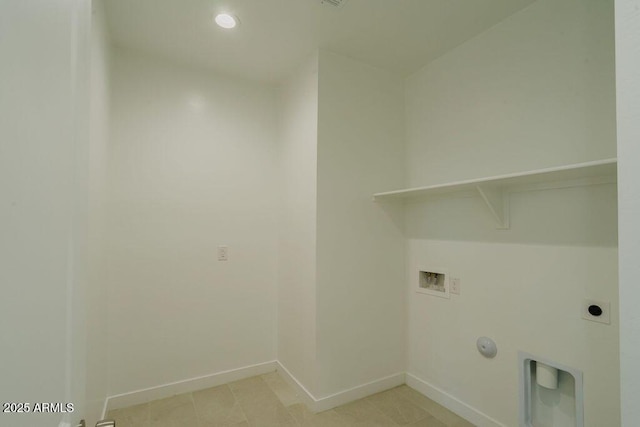 clothes washing area with electric dryer hookup, gas dryer hookup, and hookup for a washing machine