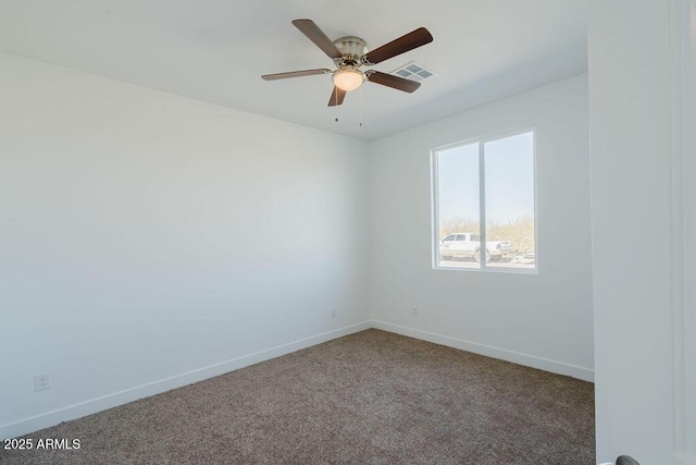 carpeted empty room with ceiling fan