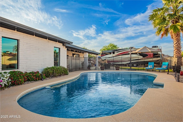 12866 W Orange Dr, Litchfield Park, AZ 85340 - view of pool featuring a patio