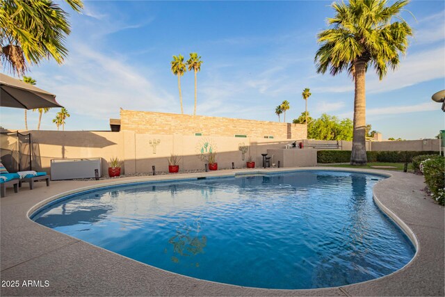 12866 W Orange Dr, Litchfield Park, AZ 85340 - view of pool featuring a fenced backyard and a patio area