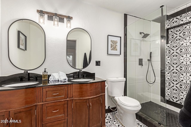 12866 W Orange Dr, Litchfield Park, AZ 85340 - full bathroom with toilet, double vanity, and a tile shower