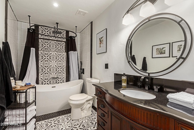 12866 W Orange Dr, Litchfield Park, AZ 85340 - full bath featuring vanity, toilet, tile patterned floors, and a combined bath / shower with rainfall shower