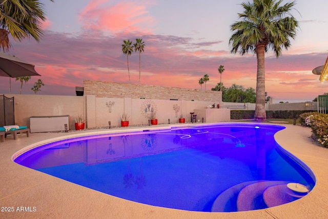 12866 W Orange Dr, Litchfield Park, AZ 85340 - view of swimming pool featuring a fenced backyard and a patio