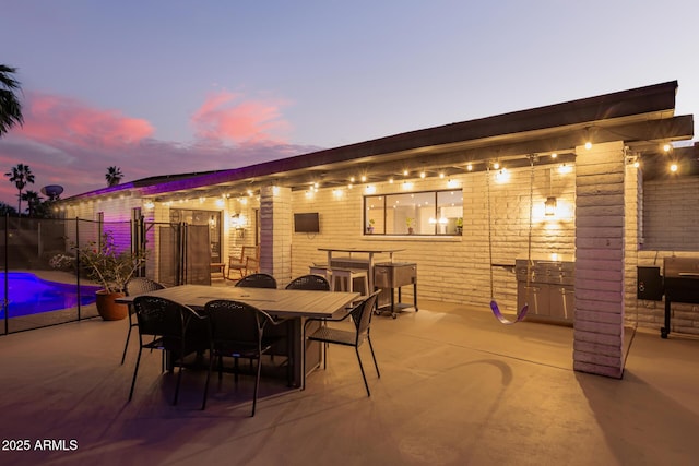 12866 W Orange Dr, Litchfield Park, AZ 85340 - view of patio / terrace featuring outdoor dining space