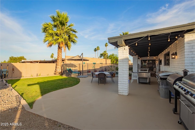 12866 W Orange Dr, Litchfield Park, AZ 85340 - view of patio / terrace featuring outdoor dining area and a grill