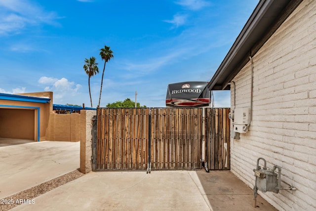 12866 W Orange Dr, Litchfield Park, AZ 85340 - view of patio / terrace featuring a gate