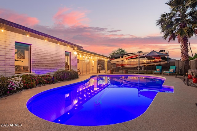 12866 W Orange Dr, Litchfield Park, AZ 85340 - view of swimming pool featuring a fenced backyard, a patio, and a gazebo
