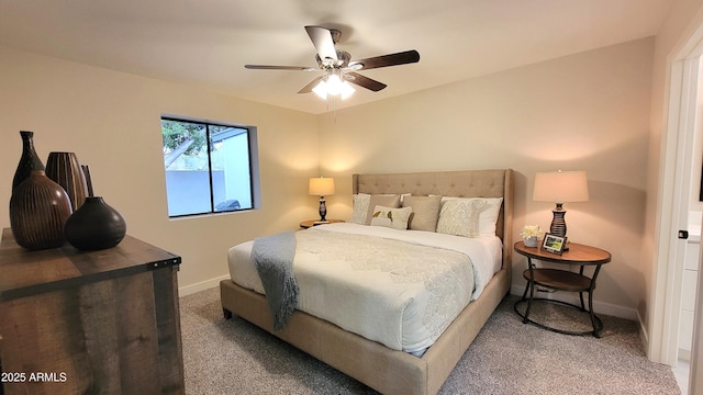 bedroom with ceiling fan and carpet