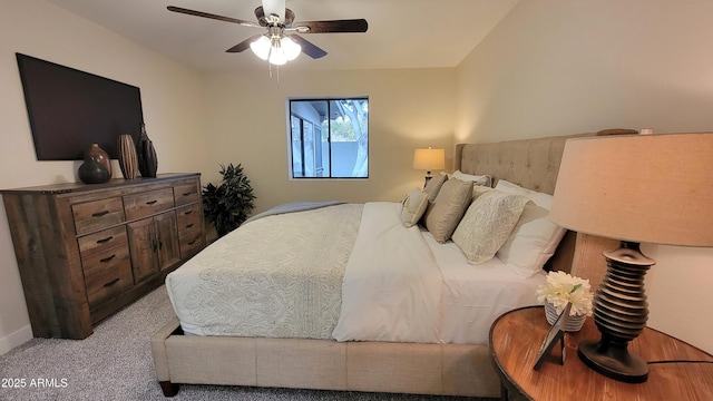 bedroom with light carpet and ceiling fan