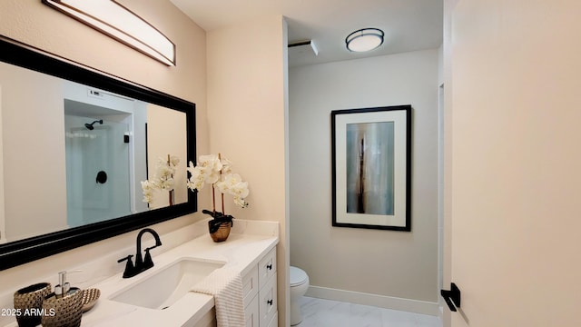 bathroom featuring walk in shower, vanity, and toilet