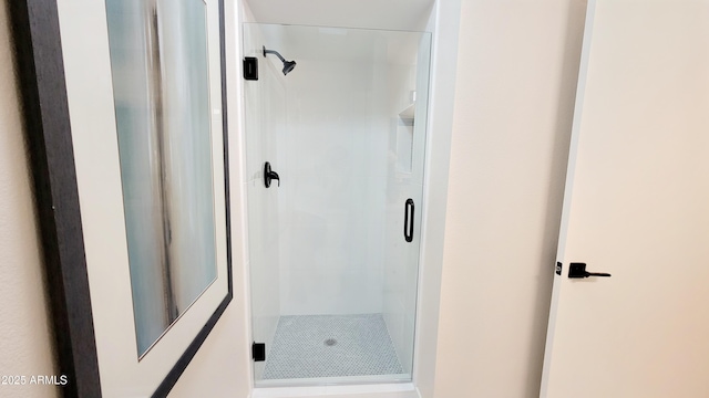 bathroom featuring walk in shower