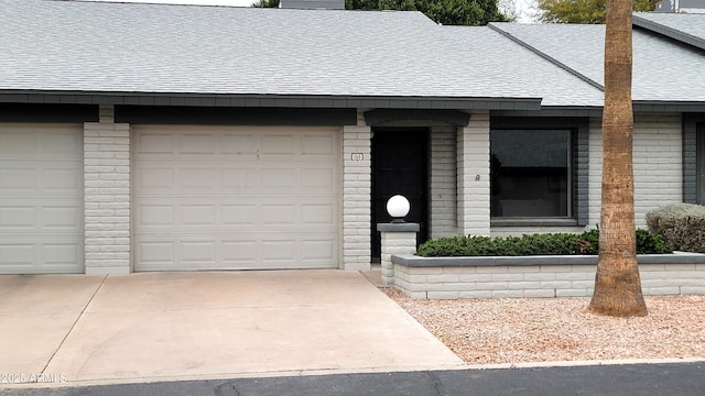 single story home with a garage