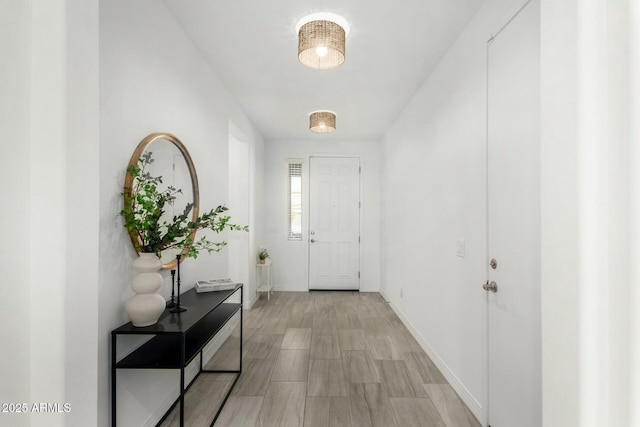 entryway with light hardwood / wood-style flooring