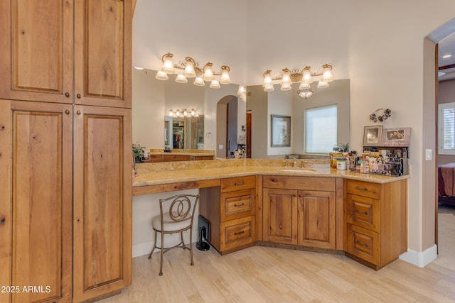 bathroom featuring vanity and hardwood / wood-style floors