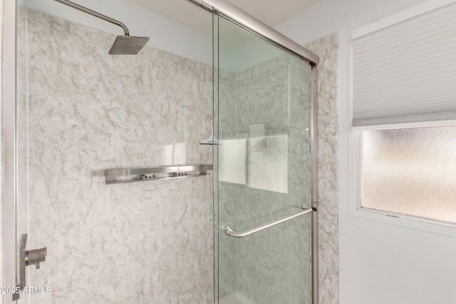 full bathroom with a shower stall