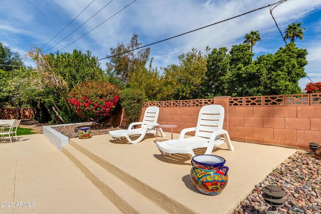 view of patio featuring a fenced backyard
