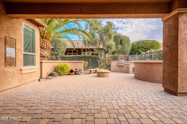 view of patio / terrace with fence, grilling area, and area for grilling