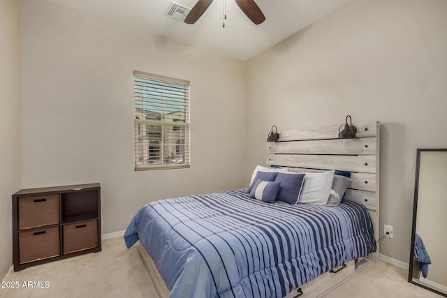 bedroom with ceiling fan and light colored carpet