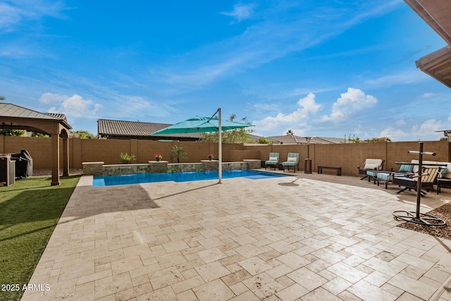 view of swimming pool featuring a patio area and pool water feature