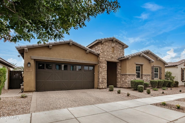 view of front of property with a garage