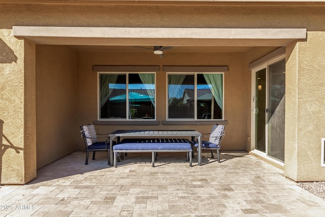 view of patio with ceiling fan