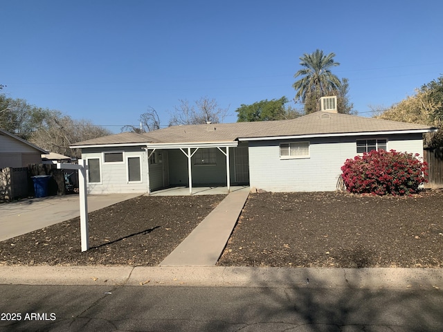 view of front of home featuring a carport