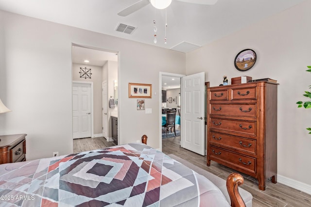 16756 S 181st Ln, Goodyear, AZ 85338 - bedroom featuring light wood-type flooring, ensuite bath, and ceiling fan