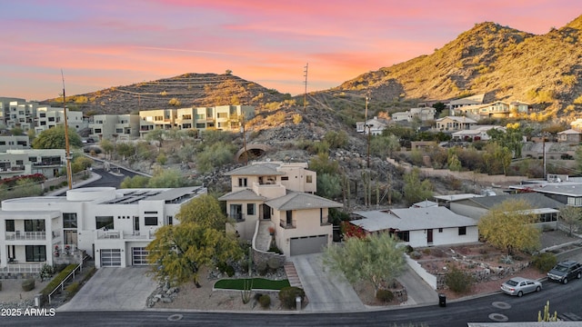 aerial view at dusk with a mountain view