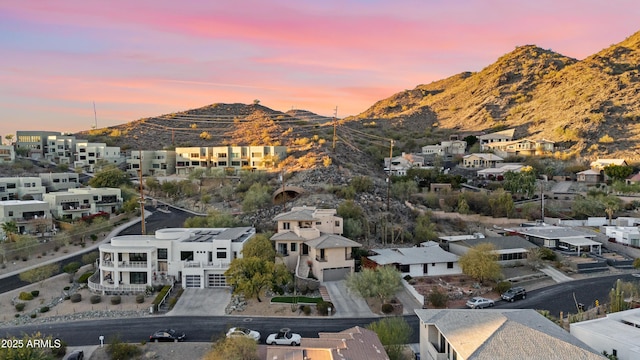 aerial view at dusk with a mountain view