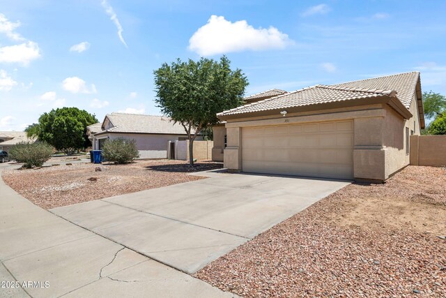 351 N Danyell Dr, Chandler, AZ 85225 - view of front of house with a tile roof, stucco siding, concrete driveway, and a garage