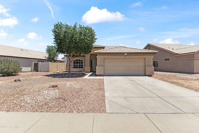 351 N Danyell Dr, Chandler, AZ 85225 - view of front of property with an attached garage, concrete driveway, a tiled roof, and stucco siding