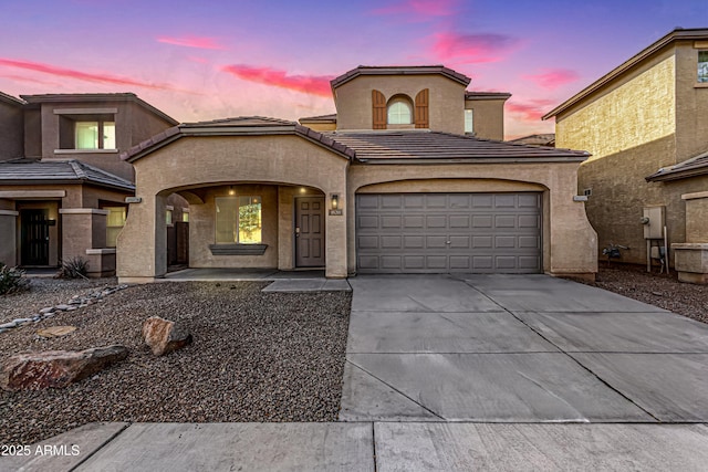 front of property featuring a garage