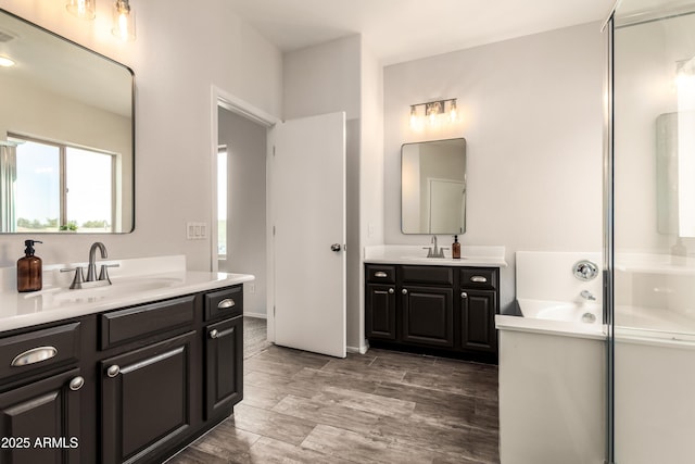 bathroom featuring vanity and hardwood / wood-style floors