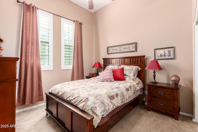 bedroom featuring carpet flooring and baseboards