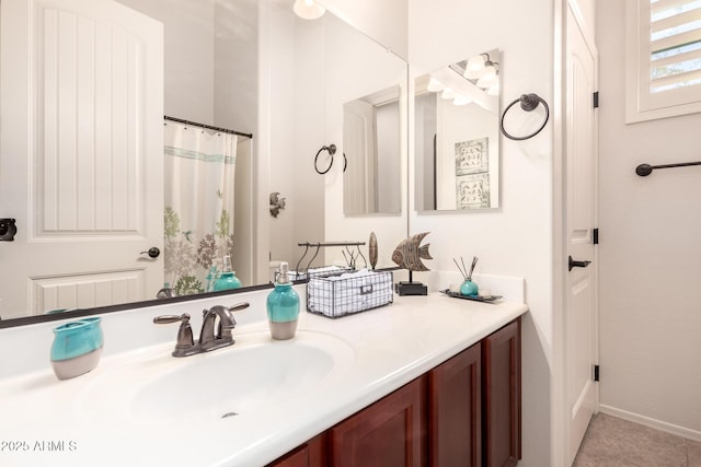 bathroom featuring tile patterned floors and vanity