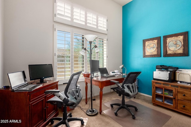 office area with baseboards and carpet