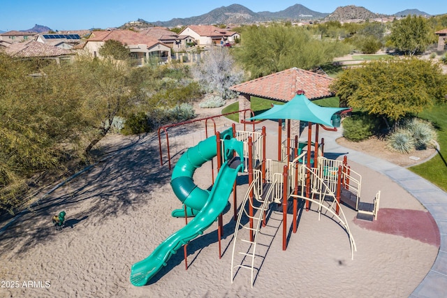 community playground with a mountain view