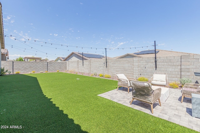 view of yard with a patio and an outdoor living space