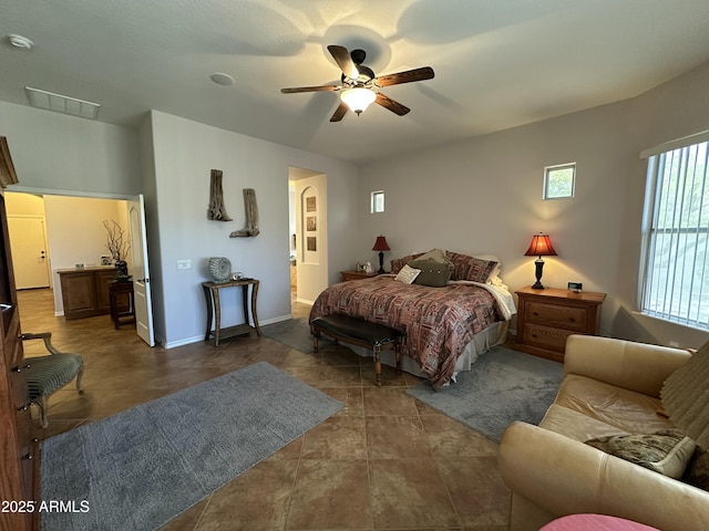 4116 E Sierra Sunset Trl, Cave Creek, AZ 85331 - bedroom featuring baseboards, visible vents, and a ceiling fan