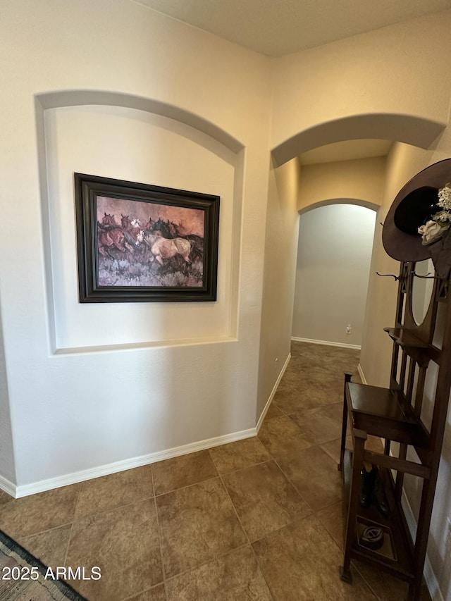 4116 E Sierra Sunset Trl, Cave Creek, AZ 85331 - corridor featuring baseboards and arched walkways