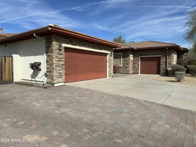 4116 E Sierra Sunset Trl, Cave Creek, AZ 85331 - view of front of home featuring a garage, a tiled roof, decorative driveway, and stucco siding