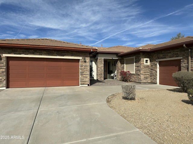 4116 E Sierra Sunset Trl, Cave Creek, AZ 85331 - view of front of home with concrete driveway, a tiled roof, and an attached garage