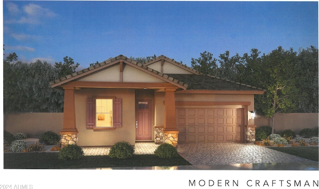 view of front of home with a garage